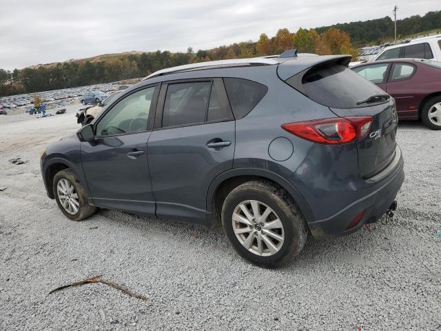 Photo 2 from auction – 2013 MAZDA CX-5 TOURI with VIN JM3KE4CE9D0160979