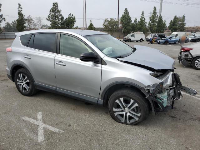 Photo 4 from auction – 2018 TOYOTA RAV4 LE with VIN JTMZFREV9JJ179035