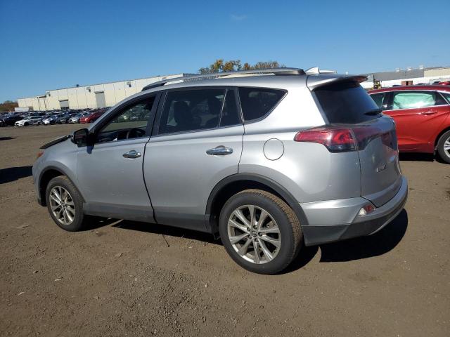 Photo 2 from auction – 2018 TOYOTA RAV4 LIMIT with VIN 2T3DFREV1JW736032