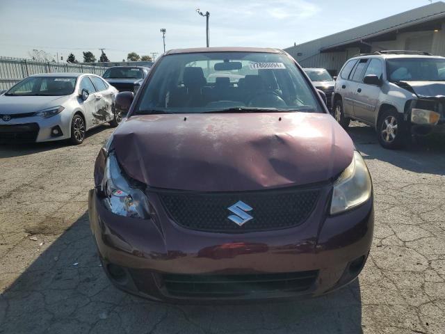 Photo 5 from auction – 2011 SUZUKI SX4 LE with VIN JS2YC5A24B6303358