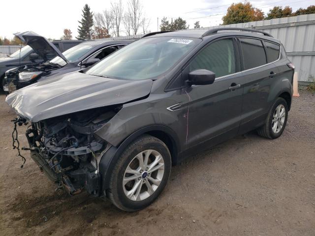 FORD ESCAPE SE 2018 with VIN 1FMCU0GD5JUA59013 - Photo from auction