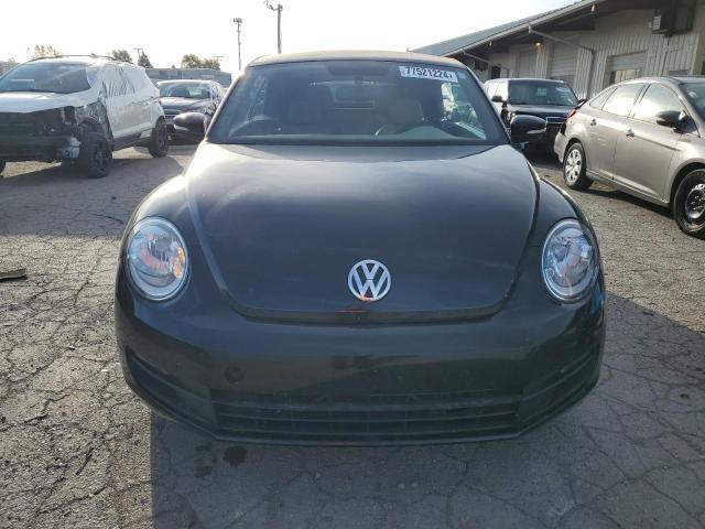 Photo 5 from auction – 2013 VOLKSWAGEN BEETLE with VIN 3VW5P7AT2DM831924