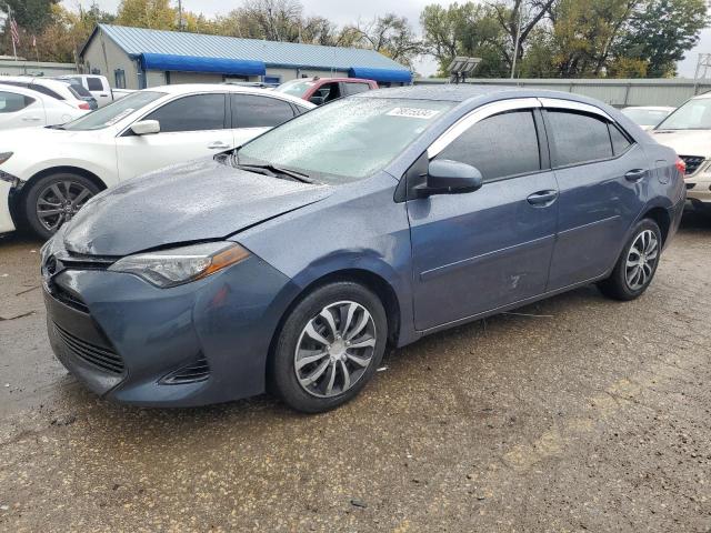 TOYOTA COROLLA L 2017 with VIN 5YFBURHE4HP574202 - Photo from auction