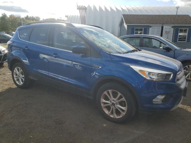 Photo 4 from auction – 2018 FORD ESCAPE SE with VIN 1FMCU0GD6JUA79738