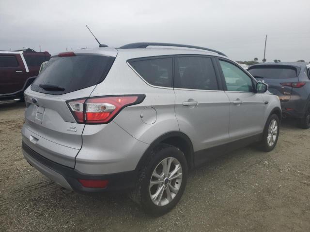 Photo 3 from auction – 2018 FORD ESCAPE SE with VIN 1FMCU0GD5JUA66088