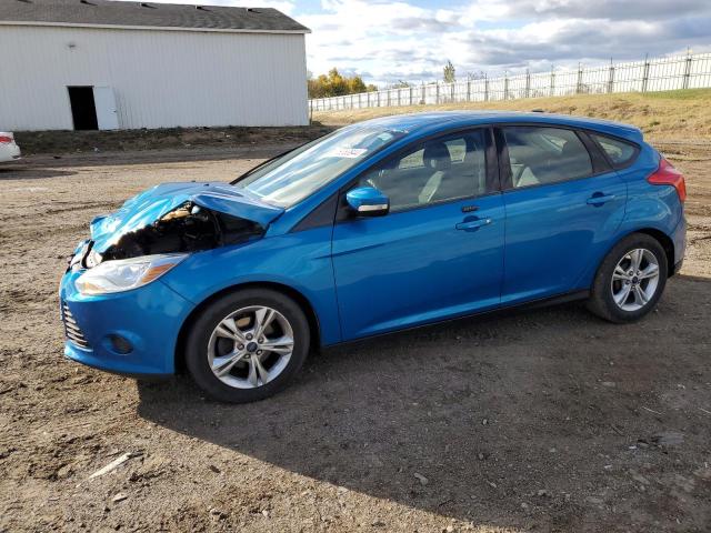 FORD FOCUS SE 2014 with VIN 1FADP3K25EL310606 - Photo from auction