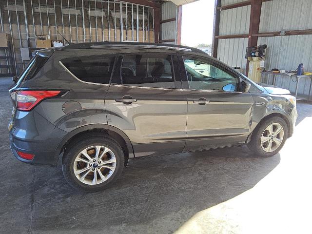 Photo 3 from auction – 2018 FORD ESCAPE SE with VIN 1FMCU0GD9JUB76576