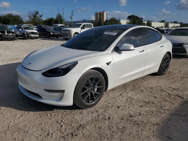 TESLA MODEL 3 2021 with VIN 5YJ3E1EAXMF921669 - Photo from auction