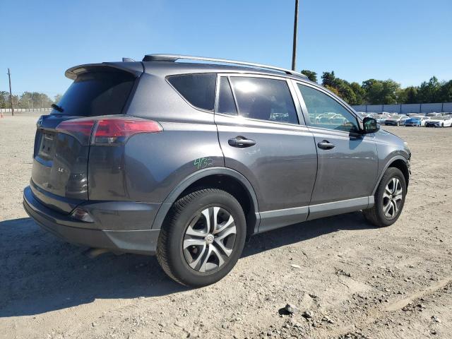 Photo 3 from auction – 2017 TOYOTA RAV4 LE with VIN JTMZFREV7HJ128532