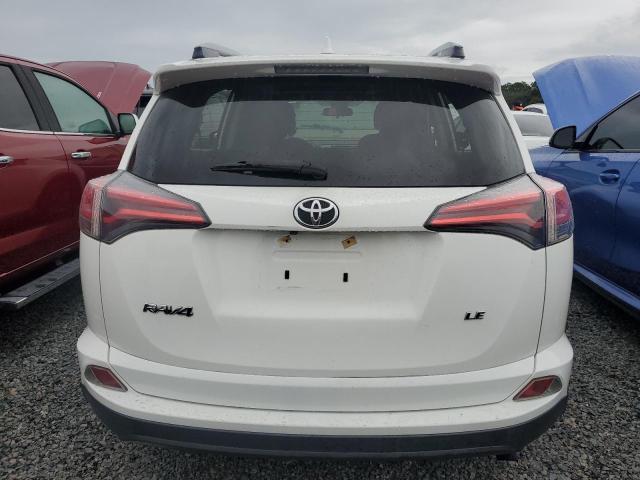 Photo 6 from auction – 2018 TOYOTA RAV4 LE with VIN JTMZFREV5JJ741240