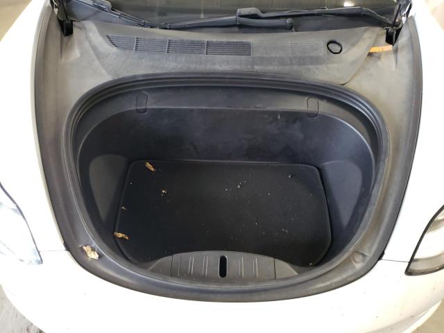Photo 11 from auction – 2018 TESLA MODEL 3 with VIN 5YJ3E1EB2JF115457