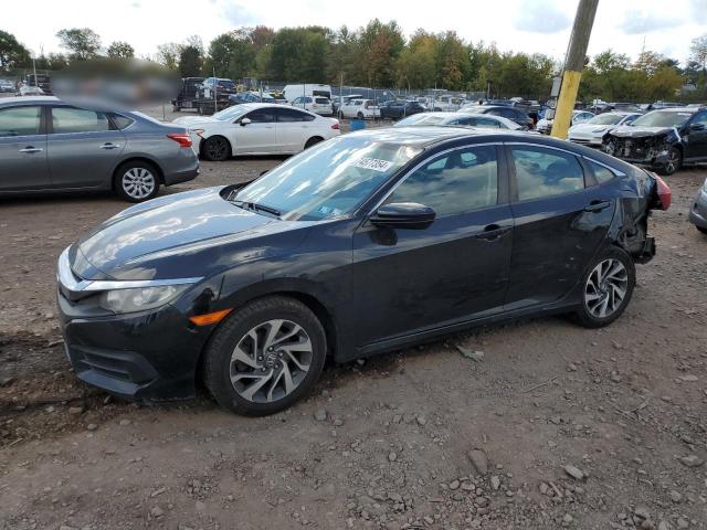 HONDA CIVIC EX 2017 with VIN 2HGFC2F79HH543664 - Photo from auction