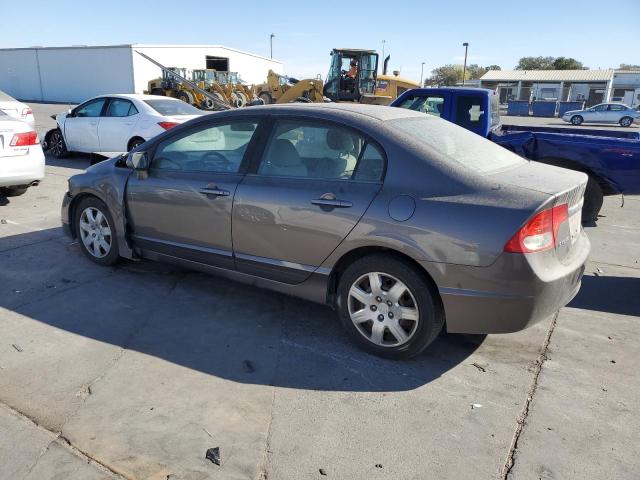 Photo 2 from auction – 2010 HONDA CIVIC LX with VIN 19XFA1F55AE014534