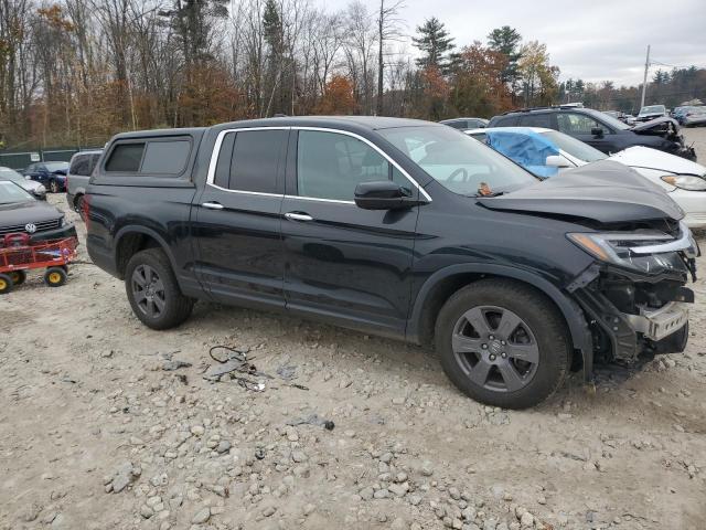 Photo 4 from auction – 2020 HONDA RIDGELINE with VIN 5FPYK3F76LB014114