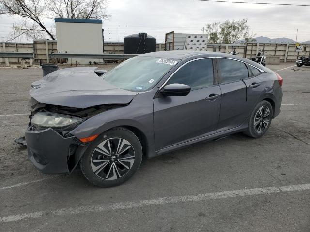 HONDA CIVIC EX 2017 with VIN 19XFC1F31HE004053 - Photo from auction