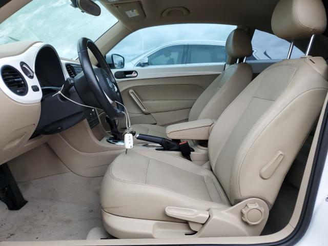 Photo 7 from auction – 2014 VOLKSWAGEN BEETLE with VIN 3VWJX7AT9EM628223