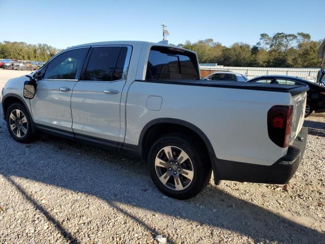 Photo 2 from auction – 2019 HONDA RIDGELINE with VIN 5FPYK3F73KB020029