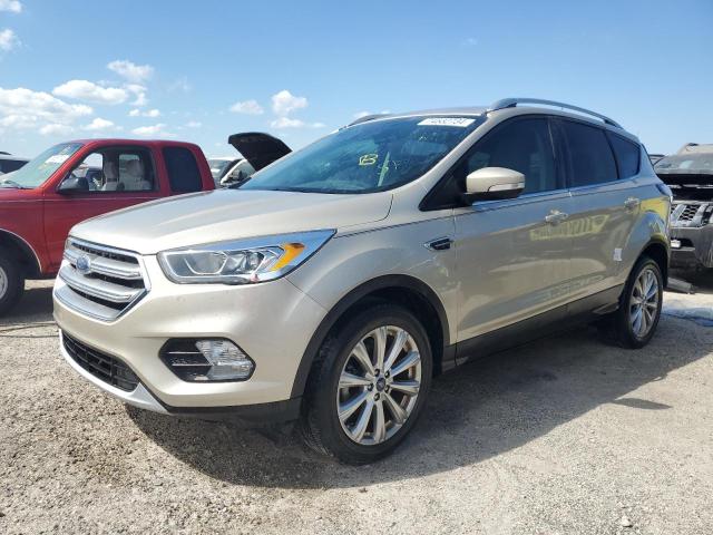 FORD ESCAPE TIT 2017 with VIN 1FMCU0JD7HUB36774 - Photo from auction