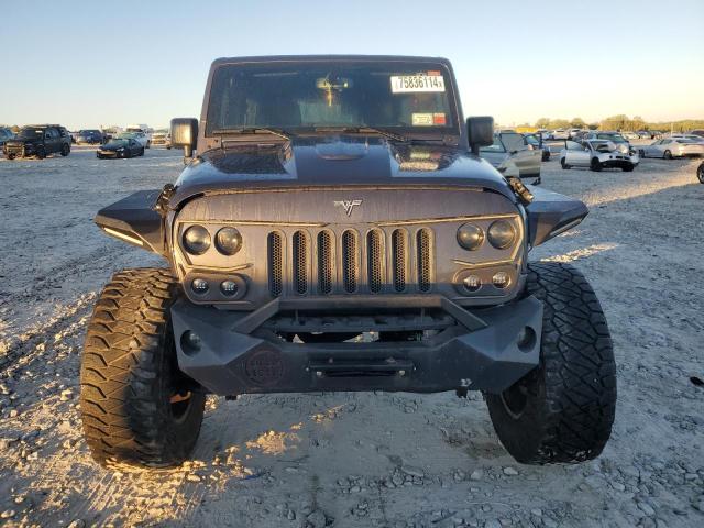 Photo 5 from auction – 2016 JEEP WRANGLER U with VIN 1C4BJWDG5GL268289