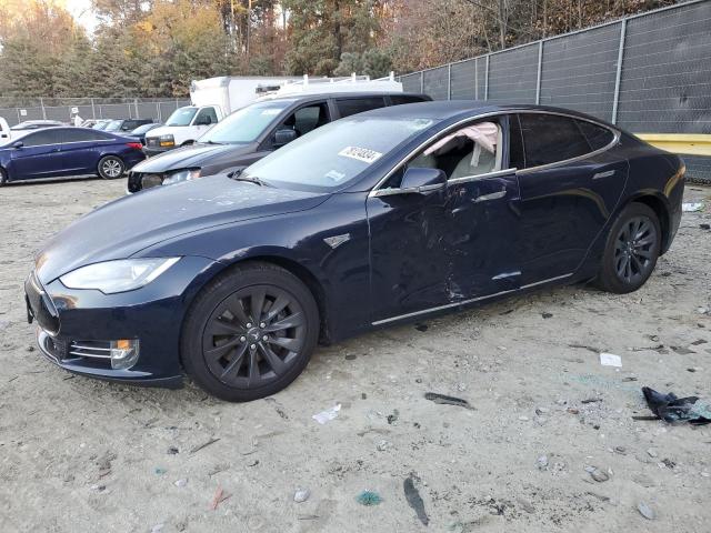 TESLA MODEL S 2014 with VIN 5YJSA1H1XEFP30547 - Photo from auction
