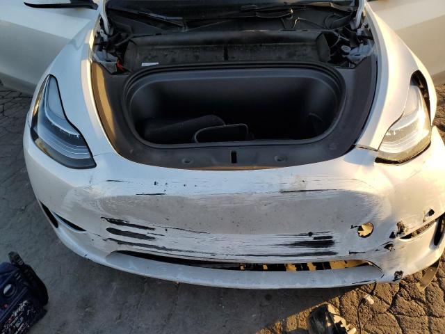 Photo 11 from auction – 2023 TESLA MODEL Y with VIN 7SAYGDEE1PA129001