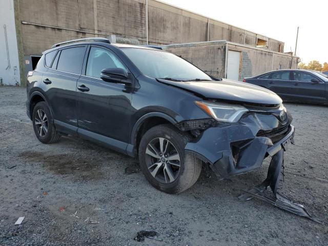 Photo 4 from auction – 2017 TOYOTA RAV4 XLE with VIN 2T3RFREV7HW597489
