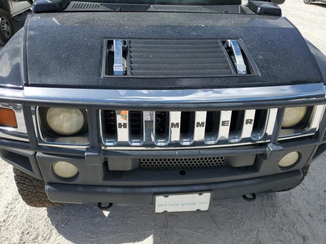 Photo 12 from auction – 2003 HUMMER H2 with VIN 5GRGN23U33H102570