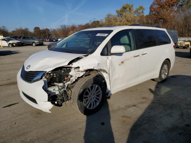 TOYOTA SIENNA XLE 2011 with VIN 5TDYK3DC8BS042290 - Photo from auction