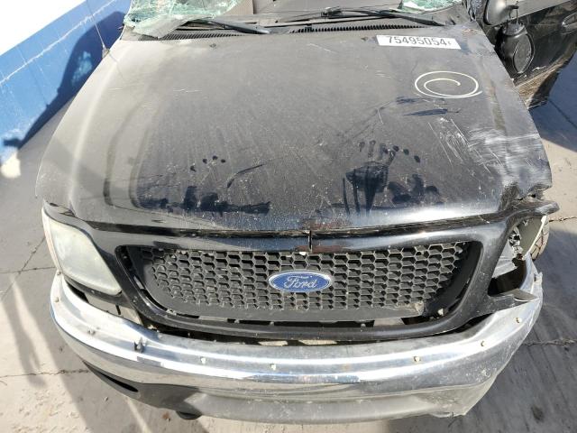 Photo 11 from auction – 2003 FORD F150 SUPER with VIN 1FTRW08L73KC80481