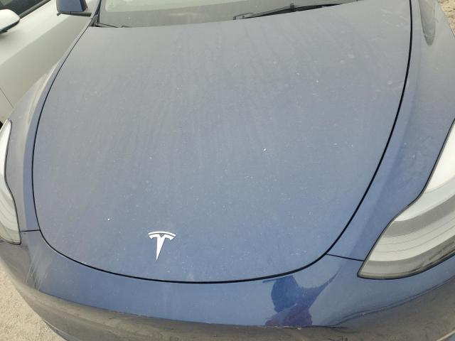 Photo 11 from auction – 2023 TESLA MODEL Y with VIN 7SAYGDEF9PF633369