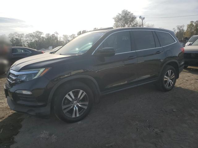 HONDA PILOT EXL 2016 with VIN 5FNYF6H68GB097263 - Photo from auction