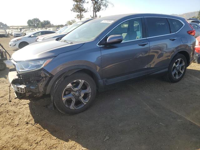 HONDA CR-V EX 2017 with VIN 7FARW1H53HE011880 - Photo from auction