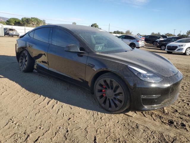 Photo 4 from auction – 2022 TESLA MODEL 3 with VIN 5YJ3E1EC8NF260677
