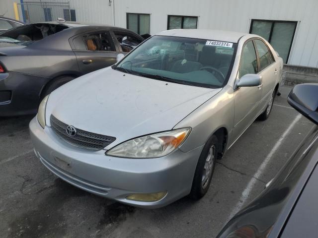 TOYOTA CAMRY LE 2002 with VIN 4T1BF30K02U501844 - Photo from auction