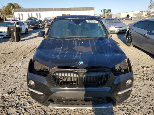 Photo 5 from auction – 2017 BMW X1 XDRIVE2 with VIN WBXHT3C30H5F76726
