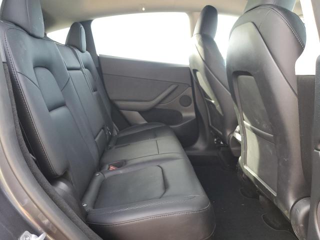 Photo 11 from auction – 2023 TESLA MODEL Y with VIN 7SAYGDEFXPF850123