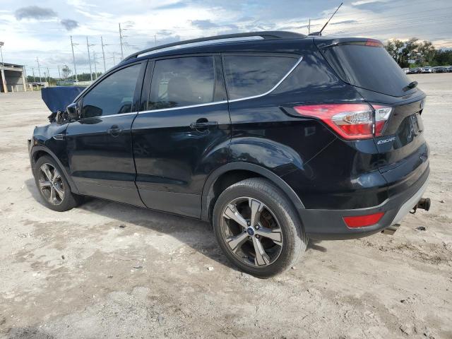 Photo 2 from auction – 2017 FORD ESCAPE SE with VIN 1FMCU9G92HUB65154