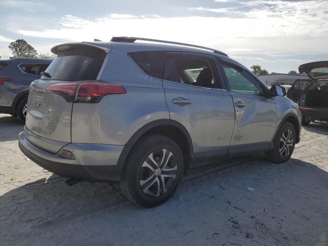 Photo 3 from auction – 2018 TOYOTA RAV4 LE with VIN 2T3ZFREV9JW520063
