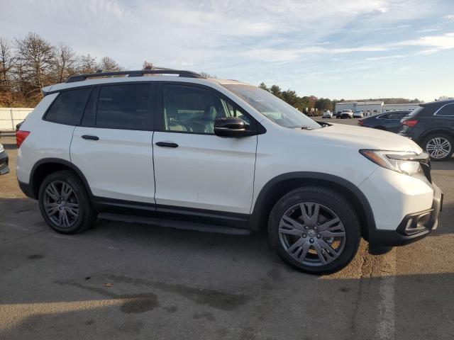 Photo 4 from auction – 2021 HONDA PASSPORT E with VIN 5FNYF8H53MB042394
