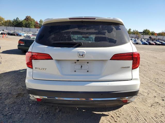 Photo 6 from auction – 2017 HONDA PILOT TOUR with VIN 5FNYF5H99HB003686