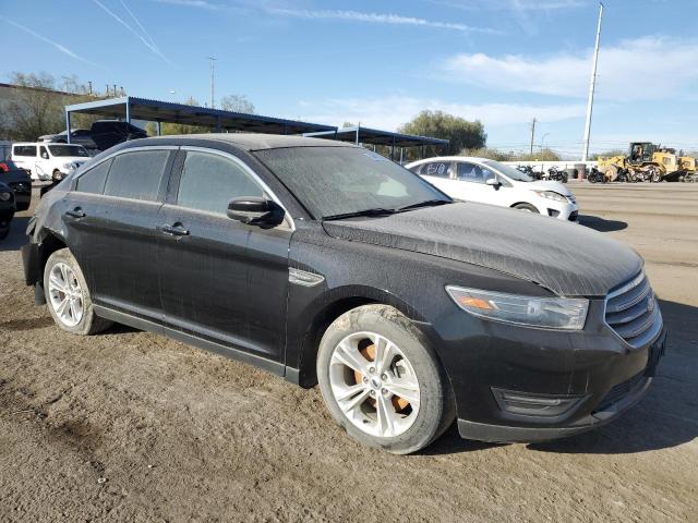 FORD TAURUS SEL 2017 with VIN 1FAHP2E83HG106458 - Photo from auction