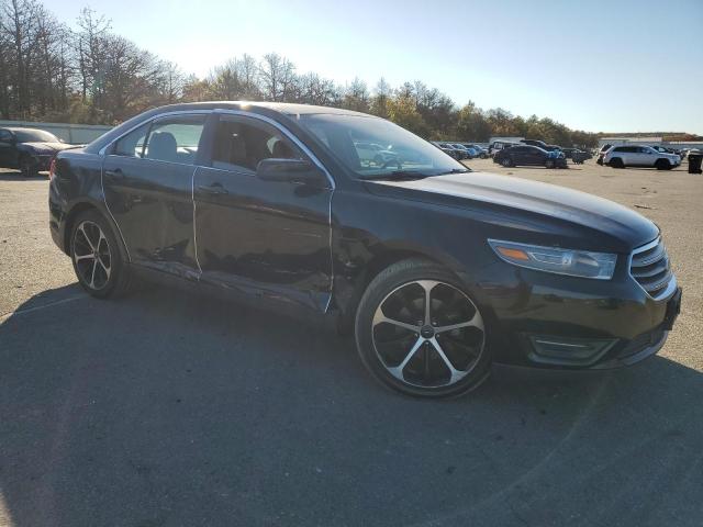 Photo 4 from auction – 2014 FORD TAURUS SEL with VIN 1FAHP2E85EG135956