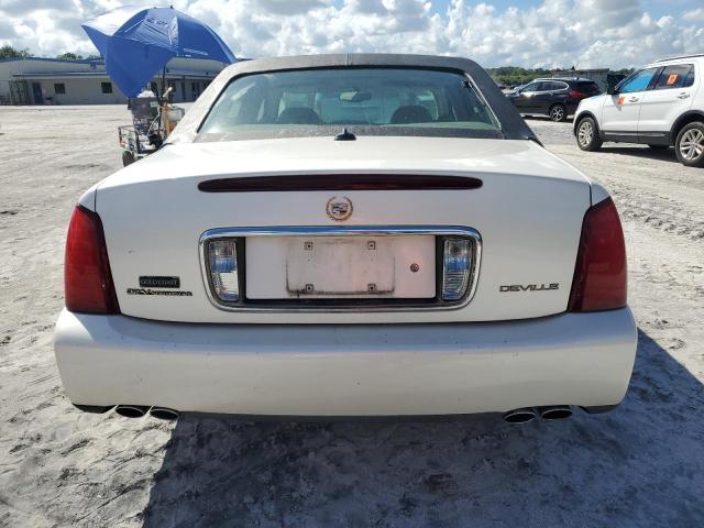 Photo 6 from auction – 2003 CADILLAC DEVILLE with VIN 1G6KD54YX3U272744