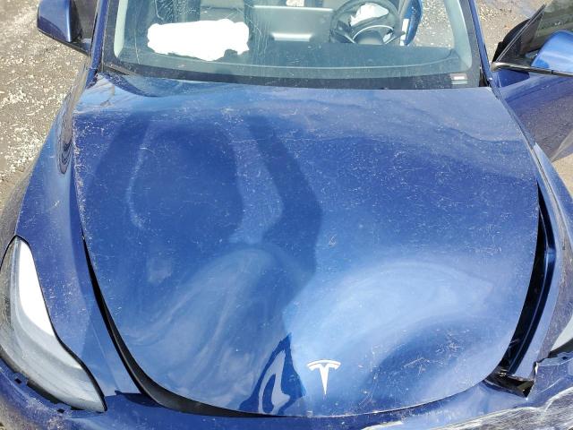 Photo 12 from auction – 2023 TESLA MODEL Y with VIN 7SAYGAEEXPF949238