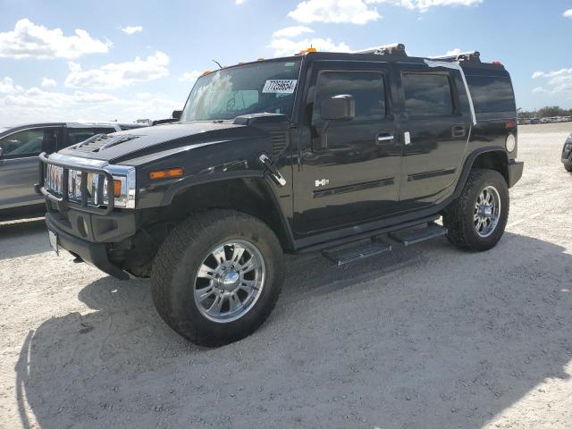 HUMMER H2 2003 with VIN 5GRGN23U33H102570 - Photo from auction