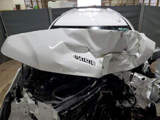 Photo 12 from auction – 2023 CHEVROLET SUBURBAN C with VIN 1GNSCFKD7PR430527
