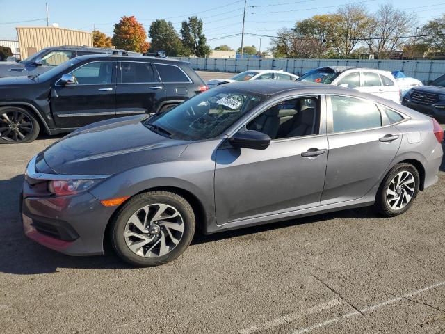 HONDA CIVIC EX 2018 with VIN 2HGFC2F75JH595704 - Photo from auction
