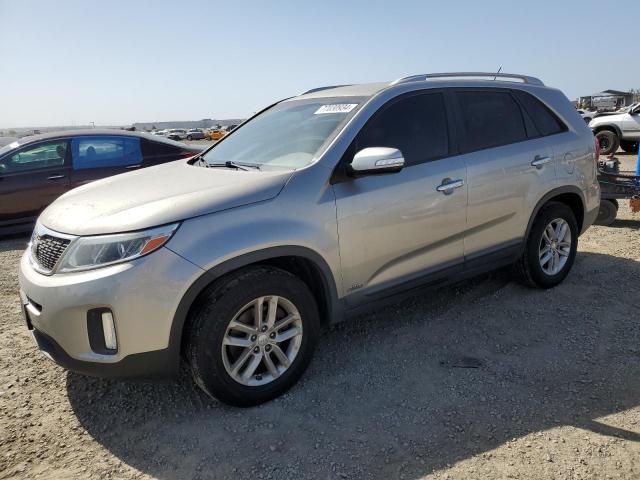 KIA SORENTO LX 2014 with VIN 5XYKTDA68EG489517 - Photo from auction
