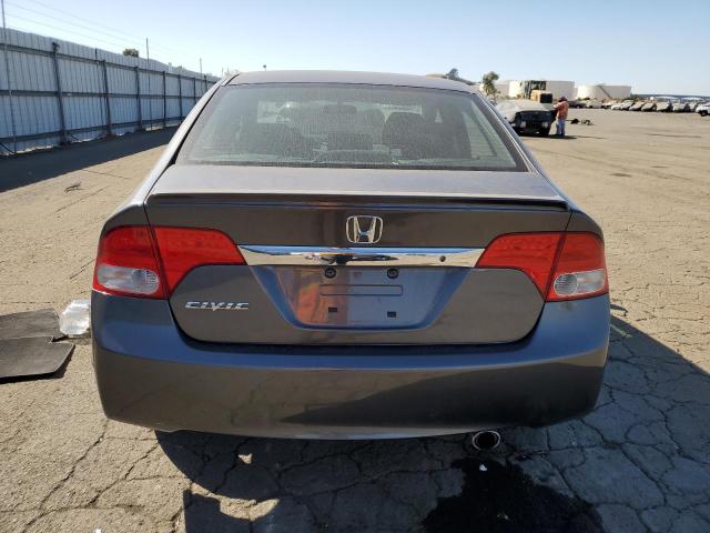 Photo 6 from auction – 2011 HONDA CIVIC LX-S with VIN 19XFA1F64BE034297