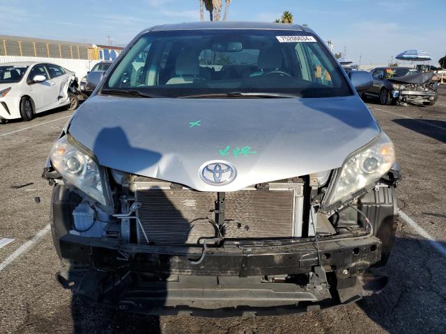 Photo 5 from auction – 2015 TOYOTA SIENNA LE with VIN 5TDKK3DC5FS671257